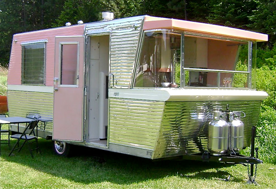 custom business trailer made from Holiday House trailer.